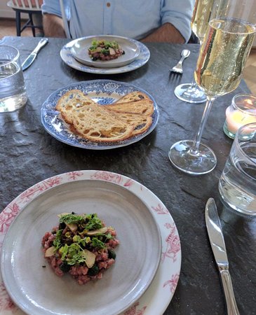 Bateau signature dishes New York Strip, House-butchered, Dry Aged Steak Cuts, 5oz Flat Iron - 21 Days Dry Aged, Steak Tartare, and Braised Short Rib